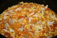 Cajun Chicken Maque Choux - Corn and tomatoes, onion, bell pepper, garlic and jalapenos, make a fabulous popular Deep South dish all on it's own, but add in a little chicken, serve over rice and you have a great main dish stew.