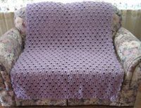 Combining two of your favorite crochet stitches, the Lavender Lace Throw is perfect for any crocheter looking to keep things easy. Using the crochet shell stitc